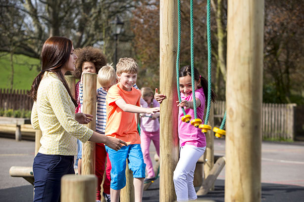 Photo of elementary school students participating in a PE class